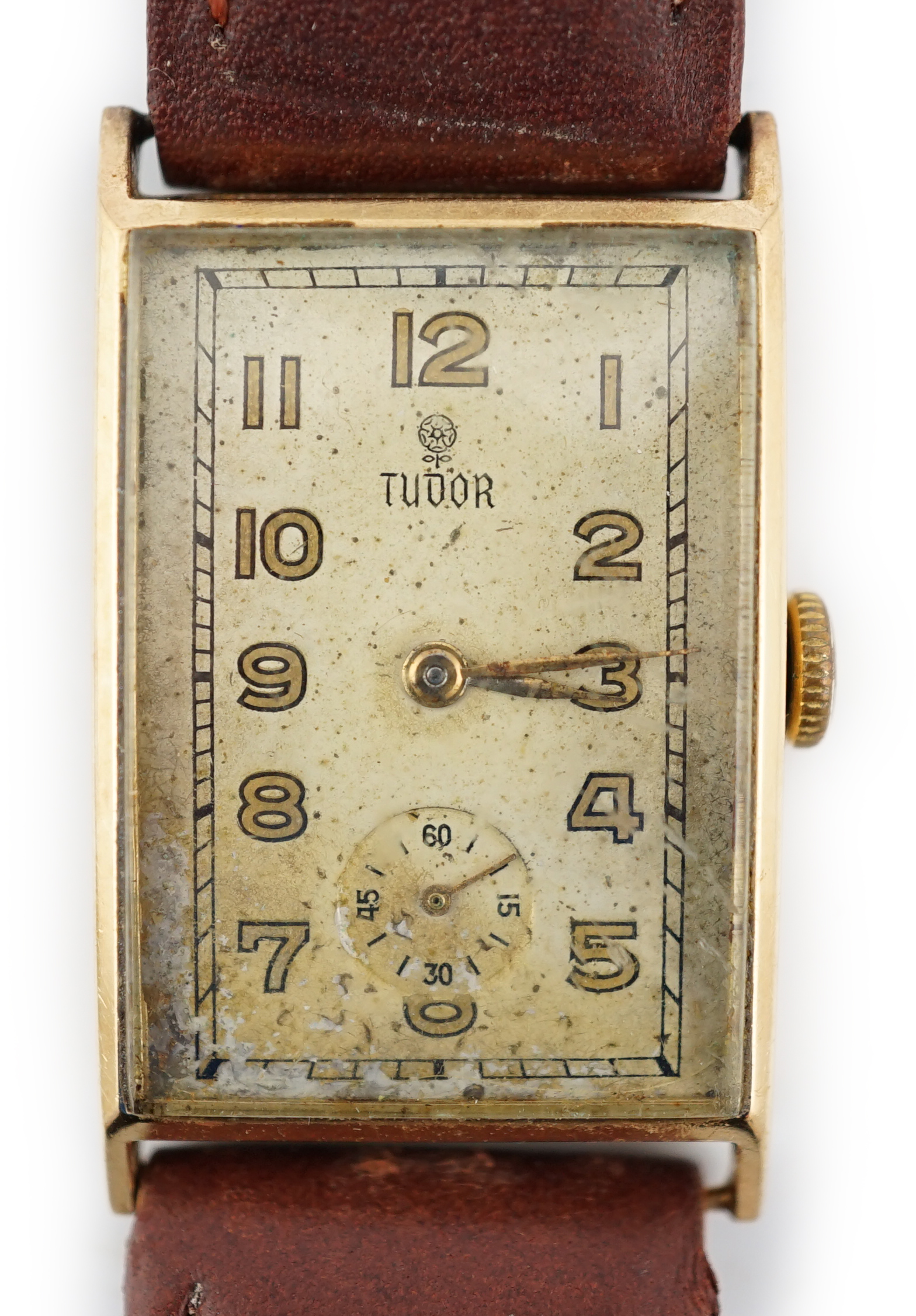 A gentleman's 1950's? 14k gold Tudor manual wind rectangular dial wrist watch